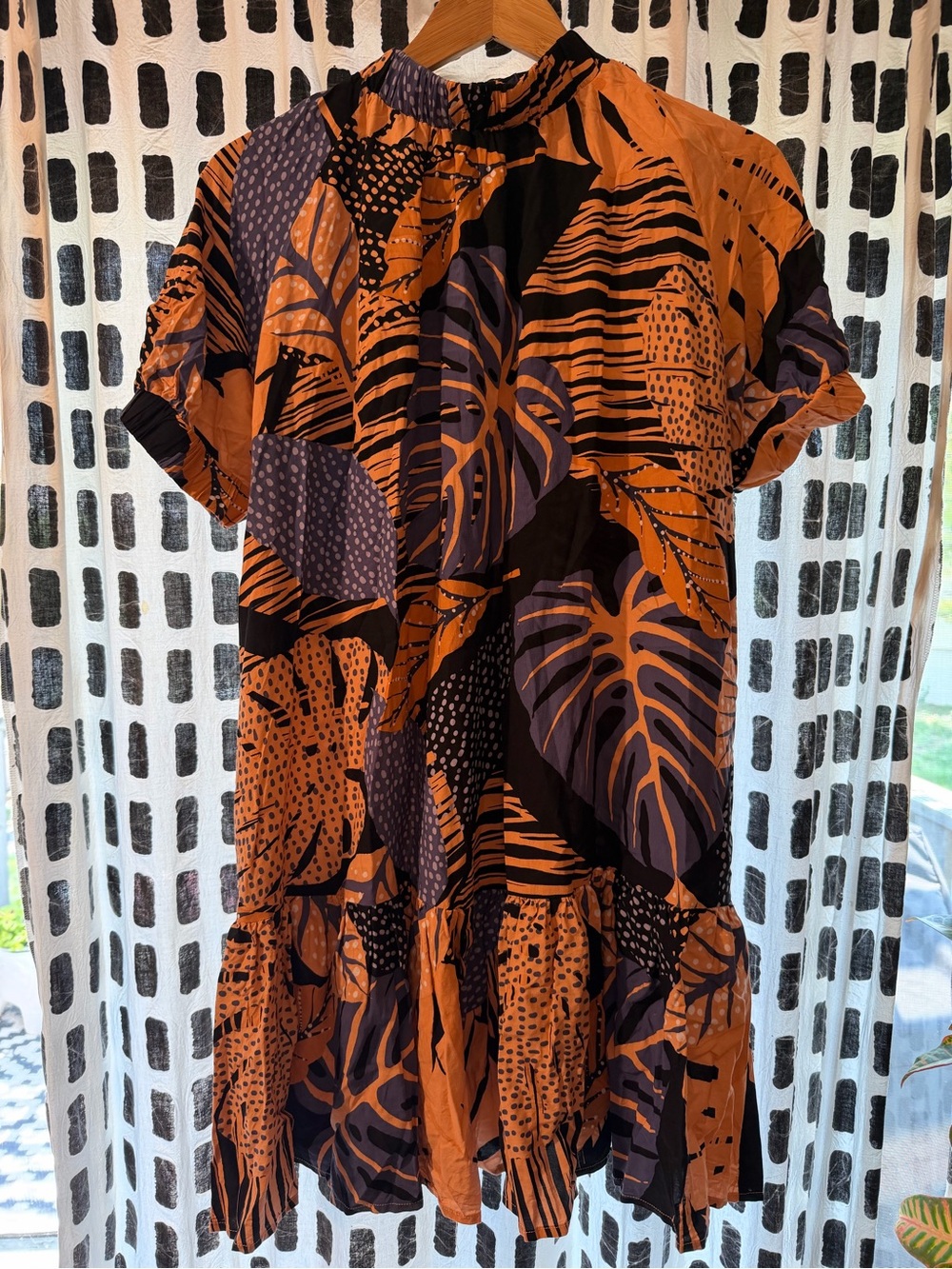 Anthropologie Tropical Print Tiered Dress in peach/navy